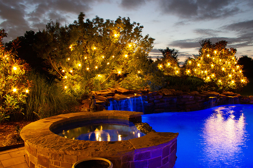 How to Transform Your Pool Area with LED Christmas Lights as Landscape Lighting